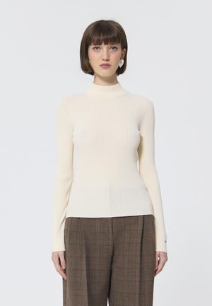 - Sweter