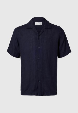 Lyhyet hihat, tummansininen pellavapaita suoran helman, klassisen kauluksen ja edessä napituksella. Tasainen rakenne ja kevyt muotoilu.