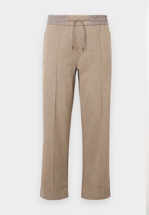 Pantaloni marrone chiaro a vestibilità comoda con vita elasticizzata e coulisse. Tessuto liscio con dettaglio di cuciture laterali e orli delle gambe affusolati.