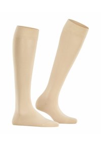 Beige knielange Socken aus glattem, dehnbarem Stoff. Mit einem gerippten oberen Bund und einer verstärkten Zehenpartie für Haltbarkeit.