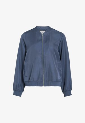 Laivastonsininen pommikoneen takki sileästä kankaasta, jossa on etuvetoketju, ribbireunukset ja kaksi sivutaskua. Yksinkertainen pyöreä kauluksen muotoilu.