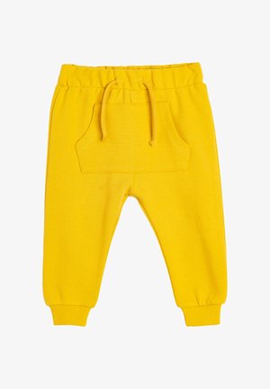 Geel trainingsbroek met een geribde textuur, elastische tailleband en een voorzak. De boorden zijn aansluitend voor een comfortabele pasvorm.