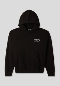 Hoodie nero realizzato in morbido tessuto con tasca frontale. Presenta un logo centrale in bianco che recita "Angel City" con elementi decorativi.