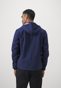Calvin Klein Golf FEATHER DRY WATERPROOF SHELL JACKET - Regnjakke - navy
