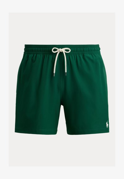 Short de bain vert foncé avec taille élastique, cordon blanc et petit logo Polo blanc sur la partie basse de la jambe gauche.