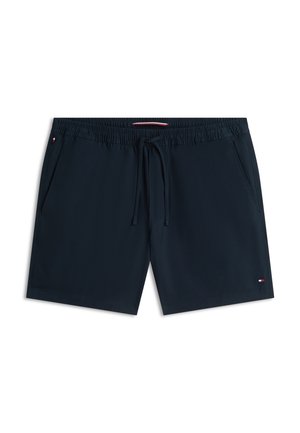 Marineblauwe zwembroek met elastische tailleband, trekkoord, zijzakken en klein Tommy Hilfiger-logo op het linkerbeen en de tailleband.