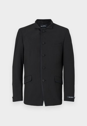 Black jacket with a mandarin collar, featuring six button closures, two side pockets, and subtle stitching details. Smooth fabric texture.