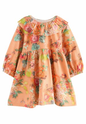 Rochie cu un model floral în nuanțe de portocaliu și verde, având un decolteu cu volane și mâneci lungi cu manșete elastice, precum și o fustă evazată.