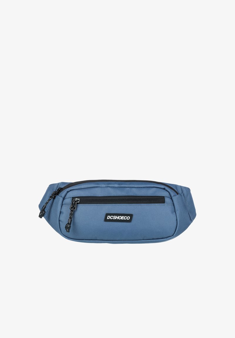 Blue fabric fanny pack with a black zipper, featuring a logo patch on the front and a contoured design for comfort and accessibility.