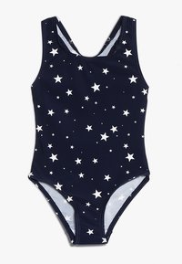 Maillot de bain marine avec des étoiles blanches, dot�é d'un col rond et de larges bretelles. Tissu lisse et design ajusté pour le confort et la flexibilité.
