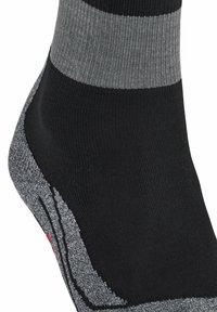 Calzini a strisce nere e grigie con texture a coste sulla parte superiore, tallone rinforzato e supporto per la caviglia morbido e imbottito.