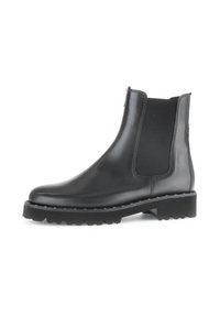 Zwarte leren Chelsea laarzen met elastische zijpanelen, een ronde neus en een robuuste zool met een gestructureerd profiel voor grip.