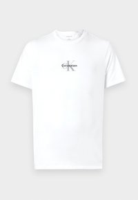 Biele tričko s krátkymi rukávmi a okrúhlym výstrihom s čiernym a šedým logom "cK Calvin Klein" potlačeným na strede hrude.