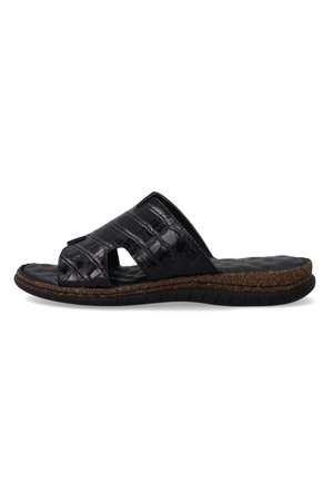 Black slide sandal with two cut-out straps, textured patent leather upper, cork sole, and a flexible rubber outsole for comfort.