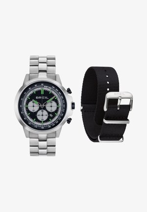 Zegarek chronograf Breil z srebrną metalową bransoletą i czarną tarczą, w komplecie z osobnym czarnym materiałowym paskiem zegarka ze srebrną klamrą.