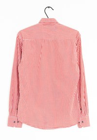 Röd- och vitrutigt långärmad skjorta med krage, med knäppningar vid ärmsluten och en rundad nederkant. Tyget verkar slätt med skarpa linjer.