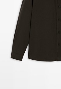 Dark brown long-sleeve button-up shirt with a smooth texture, curved hem, and black buttons; features a classic collar and tailored fit.