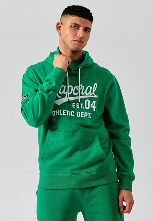 Groene katoenen hoodie met een kangoeroezak, een capuchon met trekkoord en witte grafische tekst. Ribgebreide manchetten en zoom, stof van gemiddelde gewicht.
