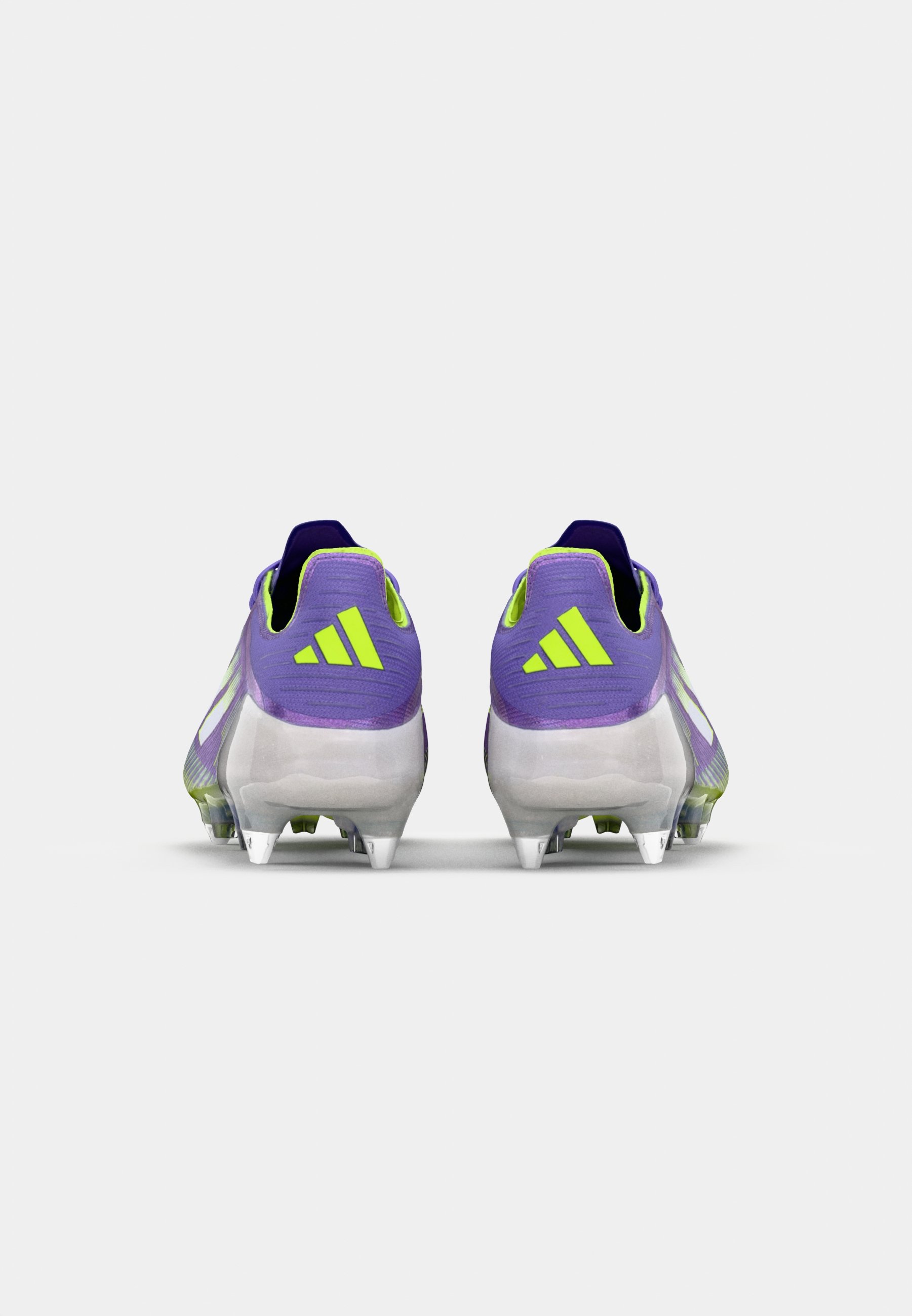 purple and white adidas cleats