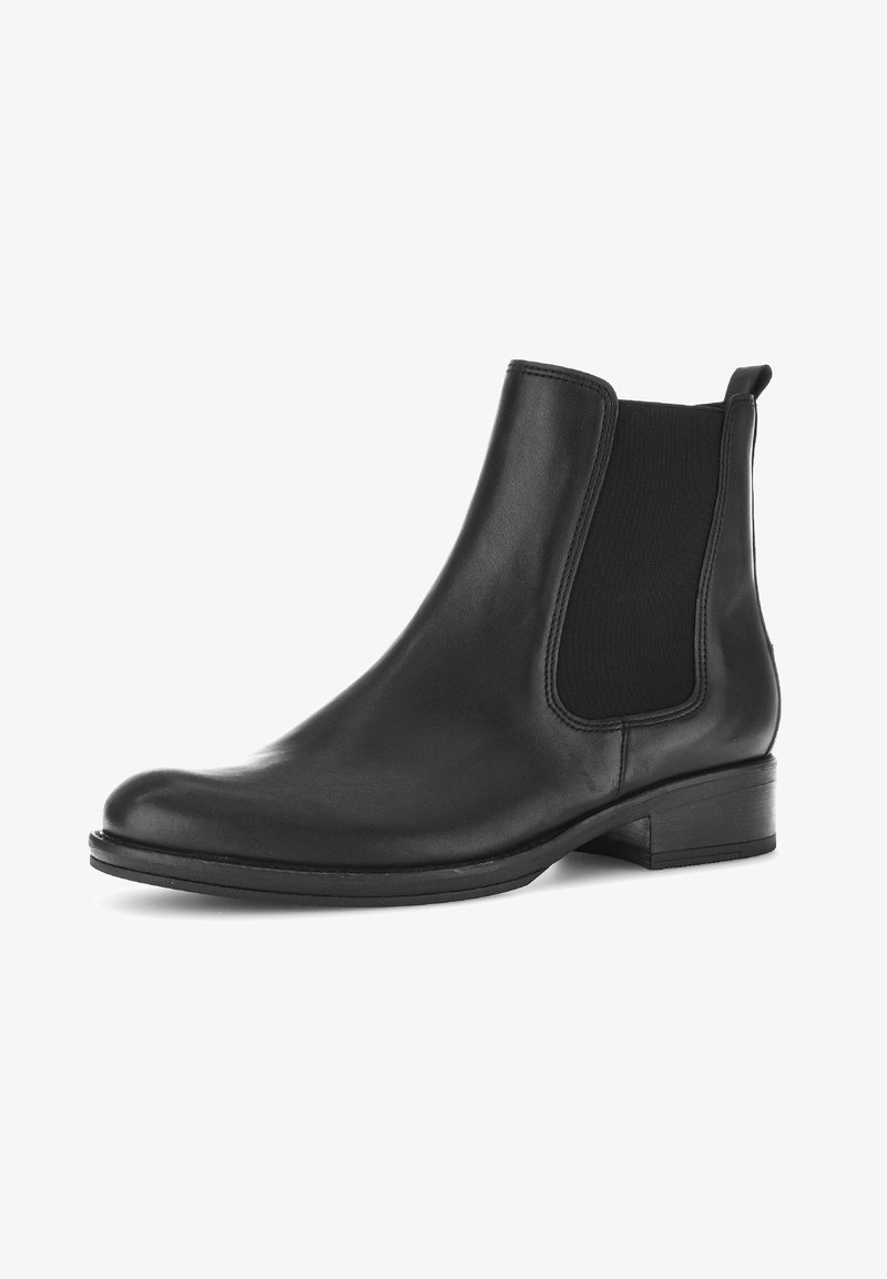 Stivaletto in pelle nera con pannelli laterali elasticizzati, punta affusolata e tacco basso impilato. Texture liscia e design semplice.