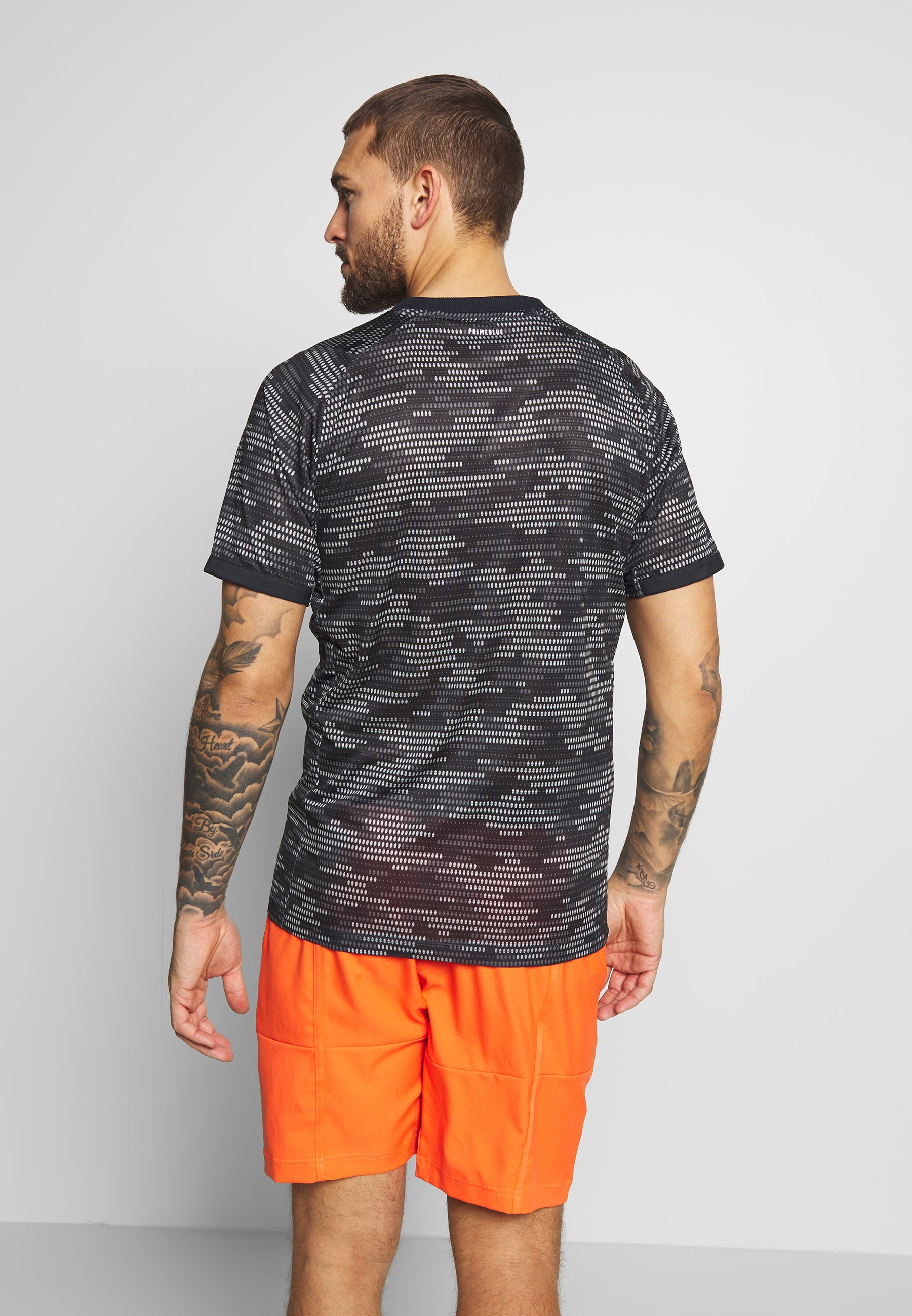 adidas Performance TEE T Shirt print blacktruora adidas Performance T Shirt print blacktruora Zalando.at