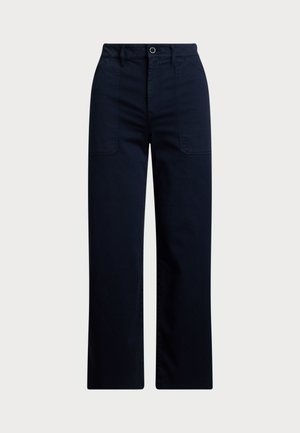Calças largas de cor azul marinho, feitas de uma mistura de algodão. Apresenta dois bolsos frontais e um fecho de botão com fecho éclair para um ajuste seguro.