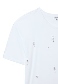 T-shirt bianca a maniche corte in cotone, con accenti di gemme trasparenti sparse, scollatura rotonda e vestibilità comoda.