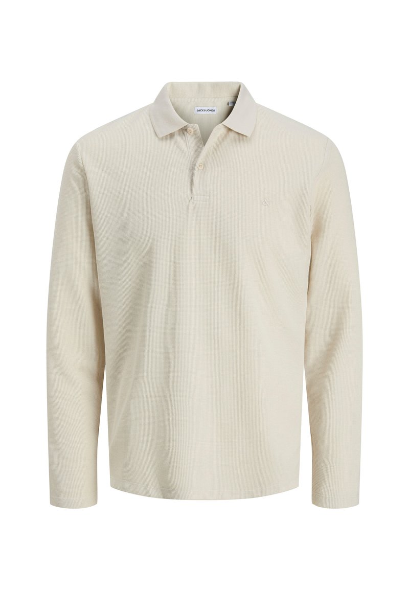 Beige long-sleeve polo shirt made from textured fabric, featuring a collared neckline, three-button placket, and tonal logo on the chest.