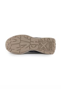 Shoe sole in a beige rubber material, featuring a textured tread design with the word "MUNICH" and stylized letter accents.