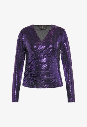 Ljubičasta majica dugih rukava prekrivena šljokicama, s V-izrezom i drapiranim dizajnom. Glatka tekstura s prilagođenim siluetom.