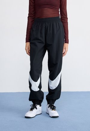 LOGO - Pantalon de survêtement - black/white