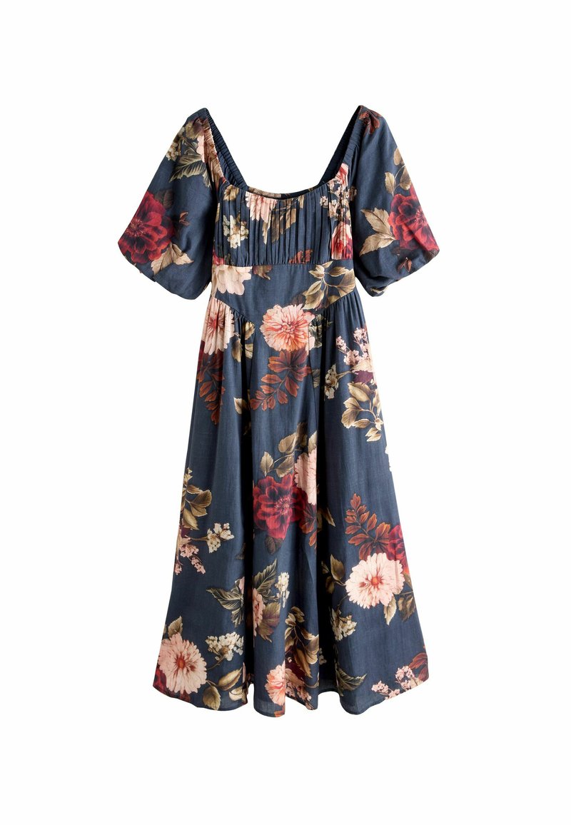 Bloemenjurk van marineblauwe katoen. Kenmerkt korte pofmouwen, een vierkante halslijn en een gathered taille met meerkleurige bloemenpatronen.