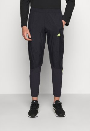 ULTRA PANT - Träningsbyxor - black/yellow