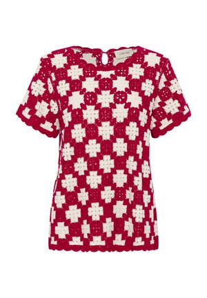 Top de ganchillo rojo y blanco con un patrón floral, con escote redondo y mangas cortas, terminado con bordes festoneados.
