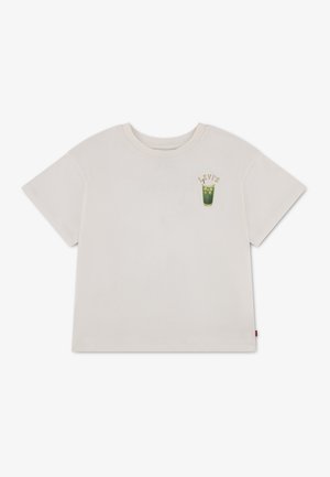 T-shirt beige clair à manches courtes avec col rond, comportant un petit motif d'une boisson glacée verte et le texte "Levi's" sur le côté supérieur gauche.