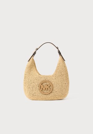 Woven beige handbag with rounded shape, adjustable dark brown strap, and round "MK" logo emblem on front center.