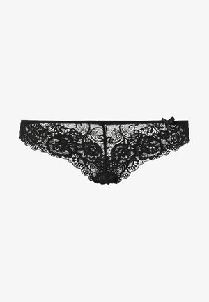 Svart blondstrømpe med blomsterdesign, bølgede kanter og en liten sløyfe ved midjen. Myk tekstur og delikat design.
