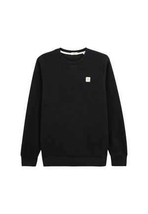 Sweatshirt noir à col ras du cou avec des manches longues, des poignets et un ourlet côtelés, et un petit patch logo carré beige sur la poitrine gauche.