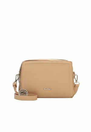 Small rectangular beige crossbody bag with silver clasp, detachable strap, and round silver keychain charm on white background.