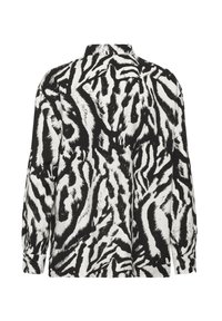 Chemise à manches longues noir et blanc avec un motif abstrait de rayures de zèbre, vue de dos, dotée d'un col et de poignets boutonnés.