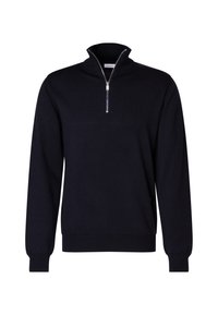 Pull noir à col zippé avec des manches longues, en tissu doux. Il présente un col montant et des poignets et un ourlet côtelés.