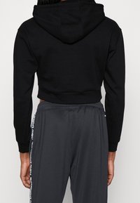 Even&Odd active Jersey con capucha - black