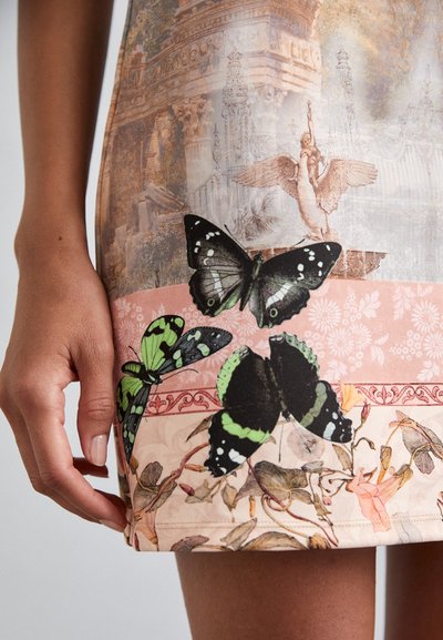 Short dress featuring a multi-colored butterfly print against a textured background with floral and architectural elements.