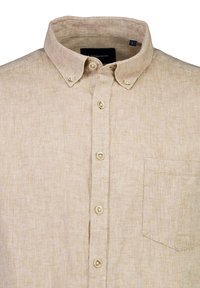 Camicia button-up beige in lino con colletto, dotata di una tasca sul petto e bottoni chiari. Tessuto leggermente testurizzato.