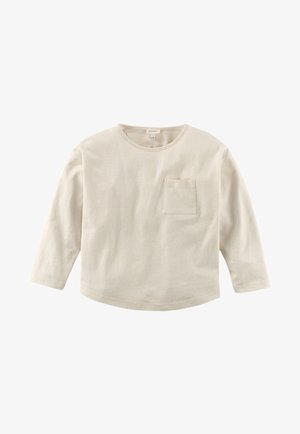 Ecru koszula z długim rękawem, okrągłym dekoltem i małą kieszonką na piersi po lewej stronie, prezentowana na białym tle.