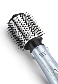 Rotating hot air hairbrush with black bristles and silver barrel, featuring a silver handle with control buttons for styling.