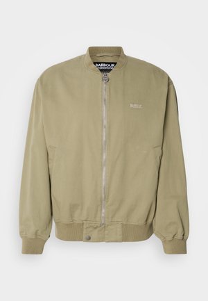 Khaki bomberjack met ribgebreide manchetten en zoom. Heeft een voorzijde rits en logo-detailing aan de linkerkant. Gemaakt van een gladde katoen stof.
