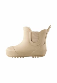 Beige vandtæt ankelstøvle med gummiudvendig, tekstureret sål, blødt foer og elastisk panel for nem påtagning. Har en bageste tab.