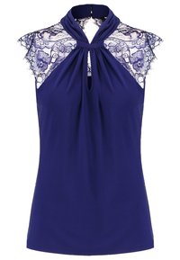 Top sans manches bleu marine avec épaules en dentelle et encolure découpée froncée nouée au cou.