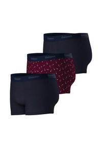 Ensemble de trois trunks : deux en navy uni et un en bourgogne avec un design à motifs. Tous présentent une ceinture bleu foncé avec le logo "Eminence".